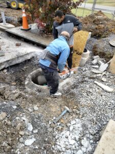 Concrete Saw Cutting & Manhole Riser Adjustment