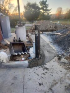 Concrete Walkway with Integrated Curb Installation with Parking Bollard
