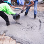 Pouring concrete for a driveway